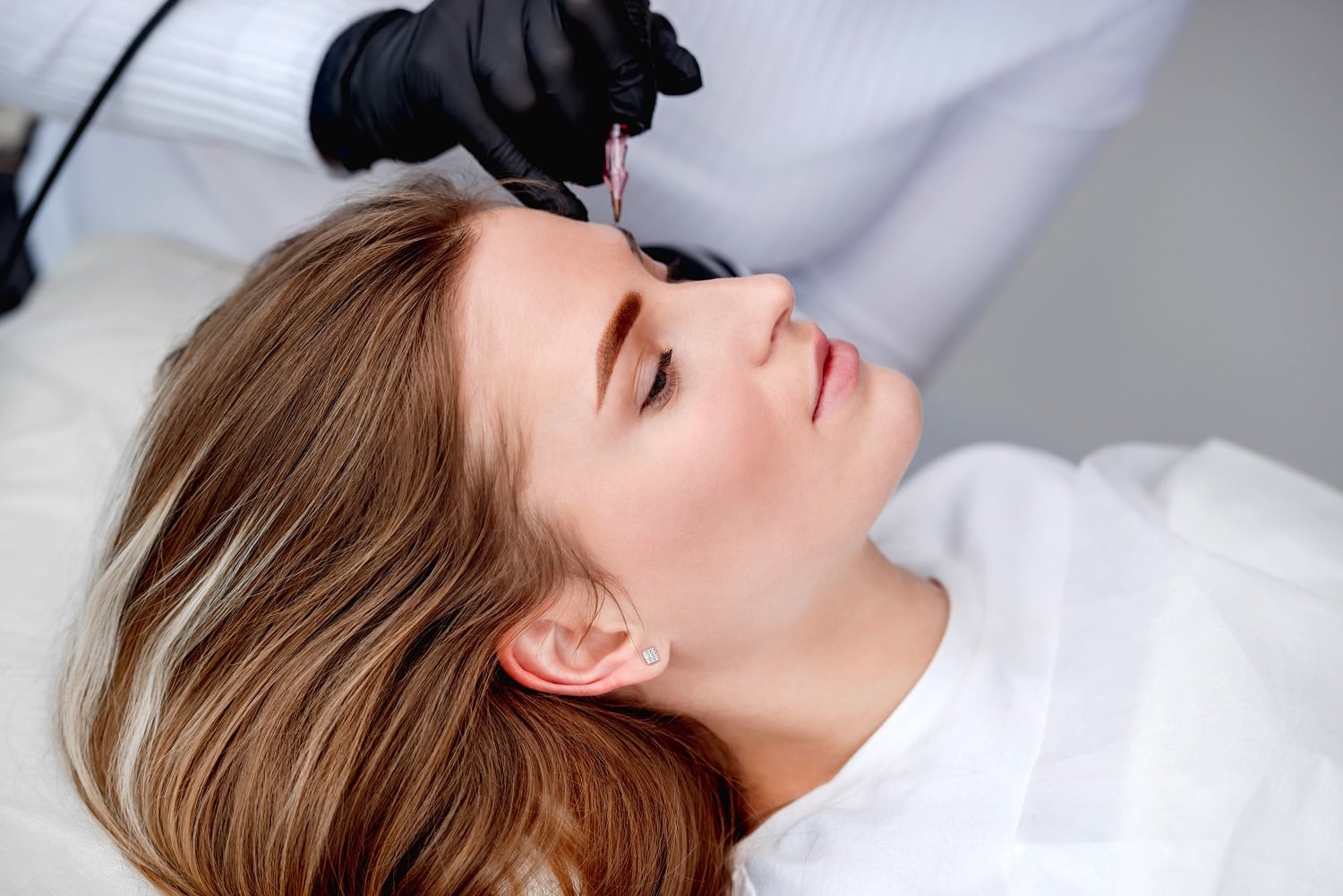 Beautiful Woman Getting Microblading Treatment | Synergy Wellness MediSpa in Red Bank, NJ