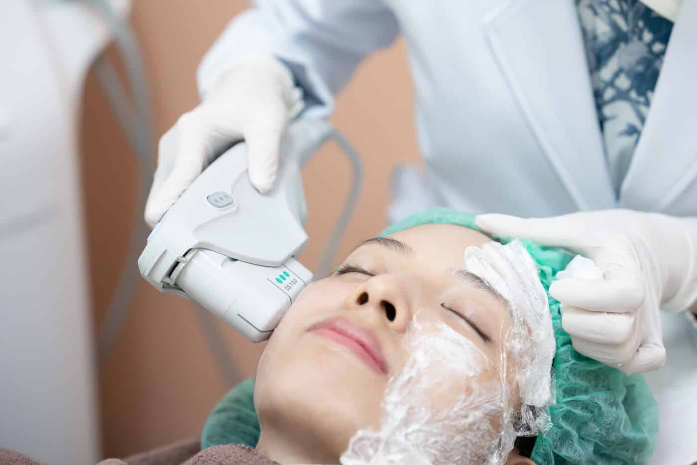 Young Woman Getting Ultrasound Therapy on her Face | Synergy Wellness MediSpa in Red Bank, NJ