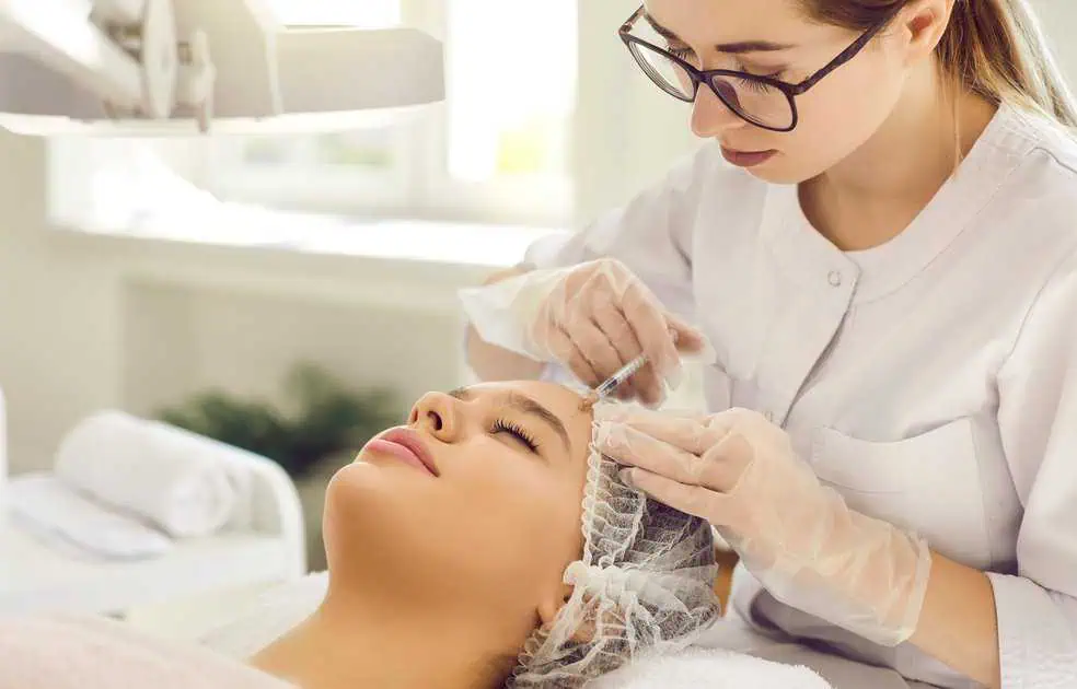 a woman getting a botox injection