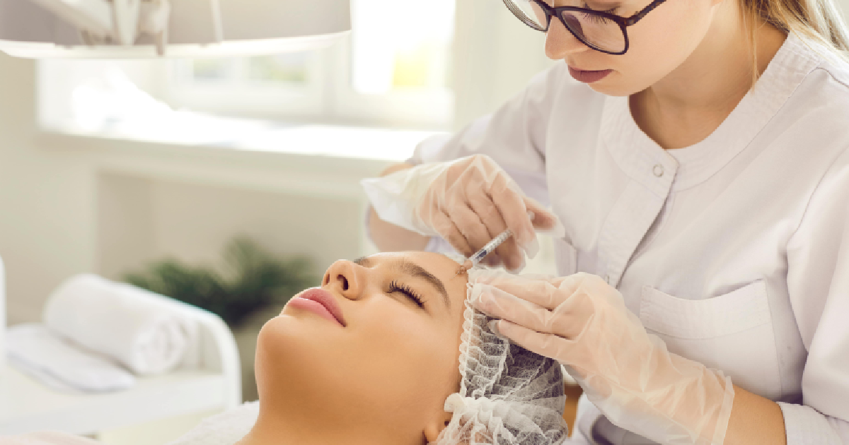 Medical professional giving a Sculptra injection to a patient in Red Bank, NJ
