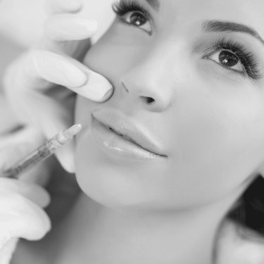 a woman getting botox injection