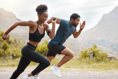 a man and woman running