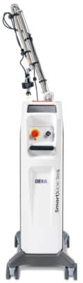 a white machine with red button | tetra-co | Oceanport, NJ | Synergy Wellness and Medispa