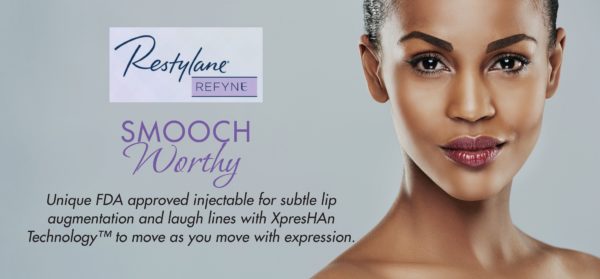 a woman with a sign - Restylane Refyne Injectables | Synergy Wellness MediSpa in Oceanport, NJ