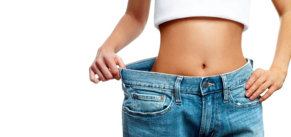 a woman wearing a pair of jeans - Synergy Wellness and Medispa in Oceanport, NJ