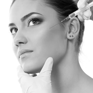 a woman getting a Botox injection in Oceanport, NJ